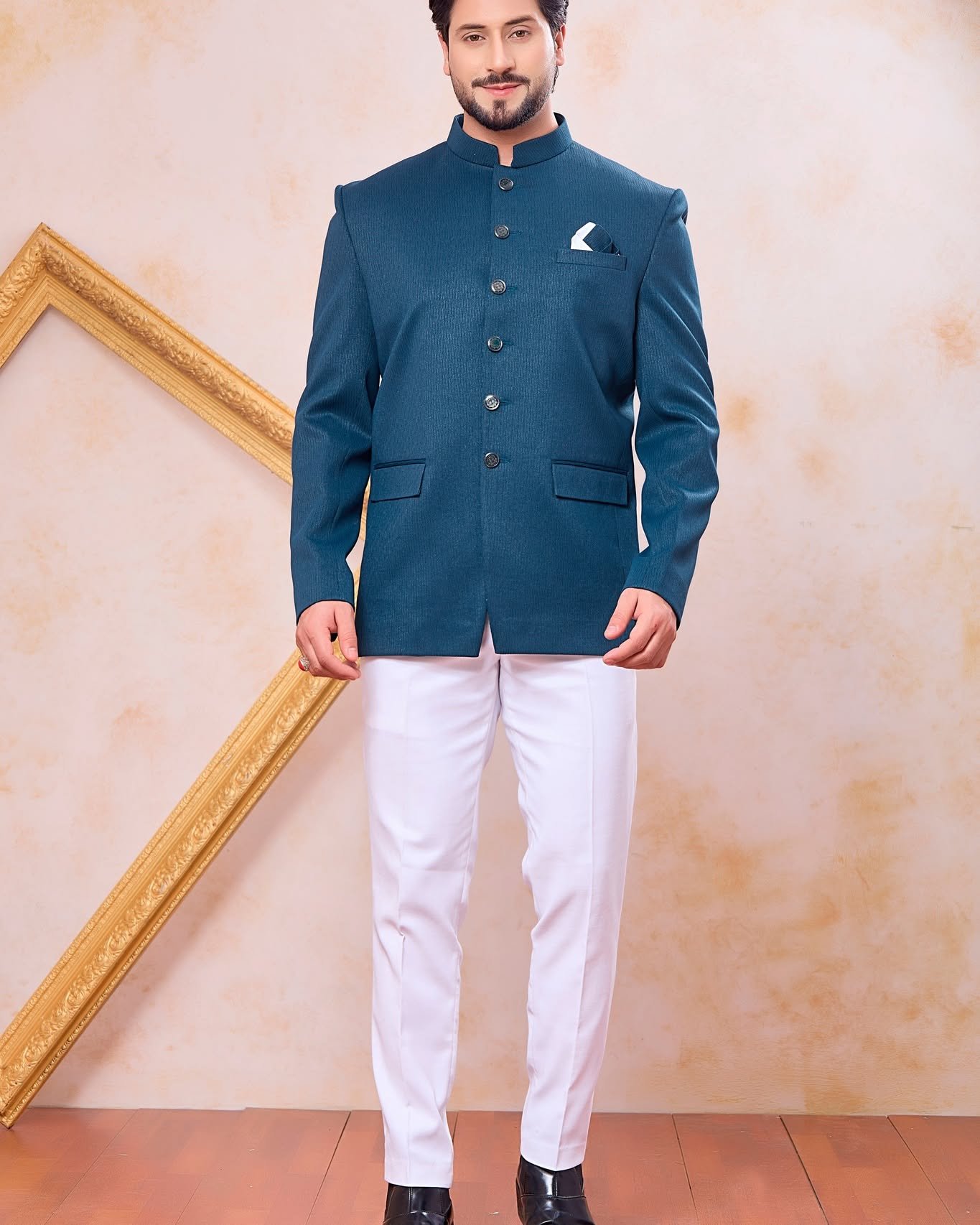 Make a sophisticated style statement with this Designer Teal Blue Jodhpuri for Men. Crafted from premium Imported Plain Fabric with a refined designer finish and luxurious Faux Satin lining, this elegant ethnic outfit is perfect for the modern groom and stylish party wear.